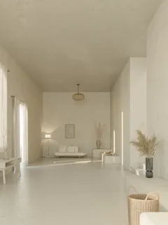 Langer weißer Raum mit Couch und Tisch